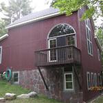 This home is one of only a handful left of it's kind. All other builder's wanted to demolish it. It's an old Sears catalogue kit home. The original home is above the stone, till the lower roof. In order to build a secure foundation, Arne had to lift the house off the rotted one, build, and reset.